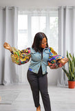african american woman wearing a puffy sleeves jean jacket both arms open